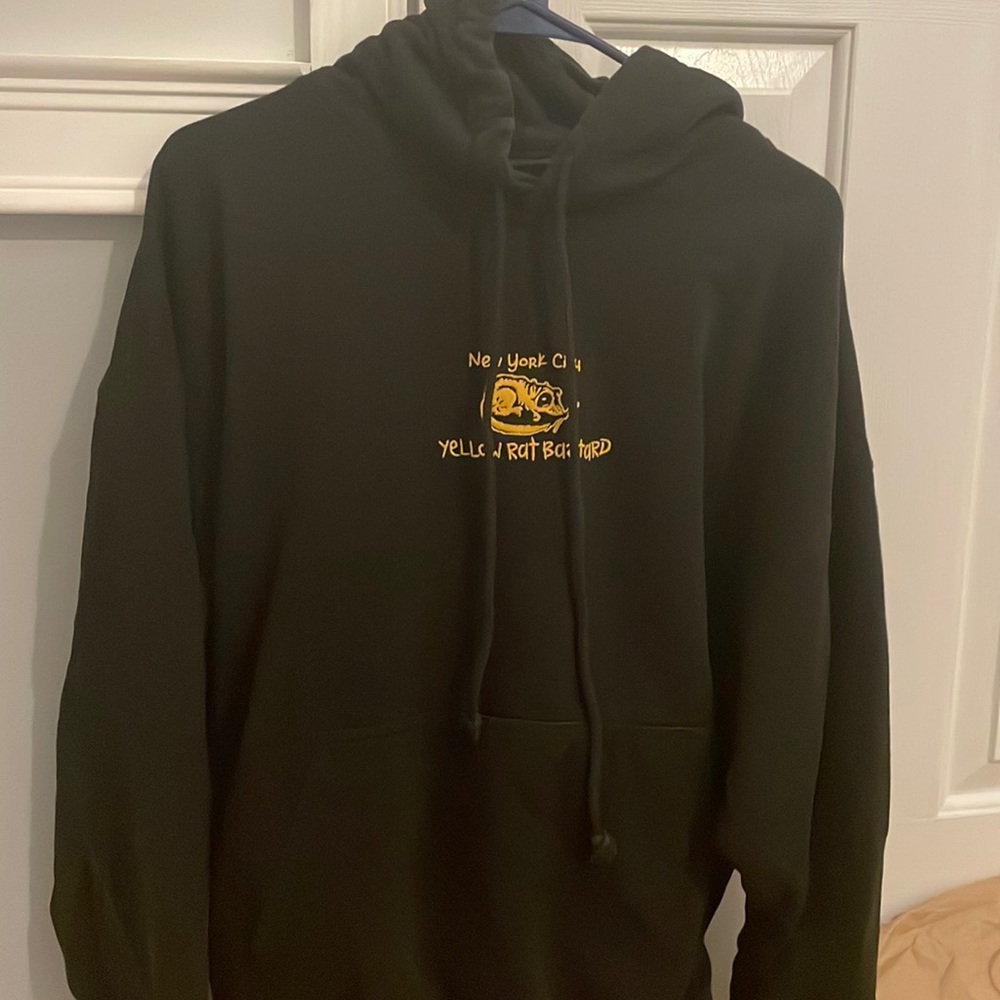 Black oversized yellow rat bastard hoodie.